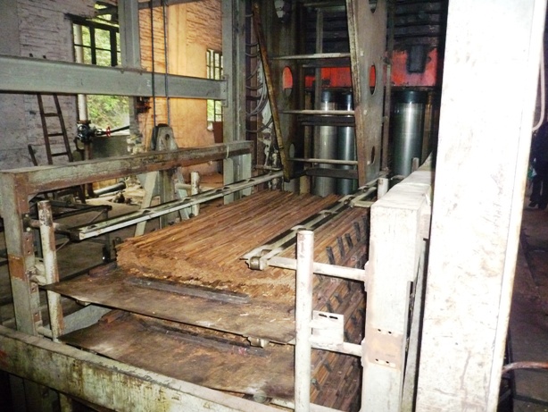 This is a picture of strand woven bamboo before compression. Look how think it is going in!