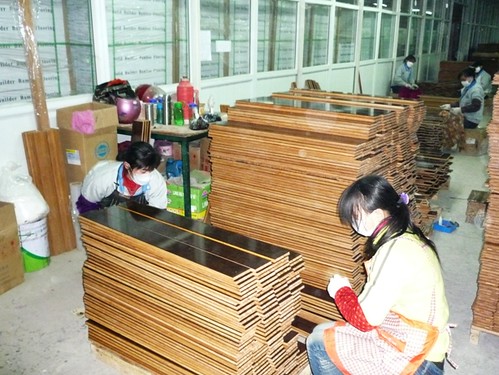 Bamboo Flooring QC Check after production Looking for visual defects on every piece